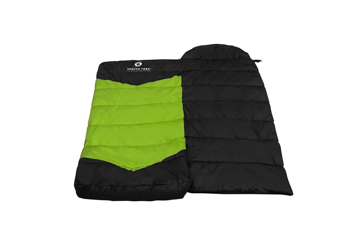 A sleeping bag with a green and black design.
