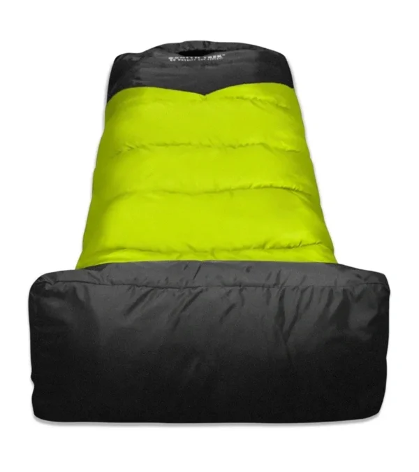 A black and green sleeping bag on top of the ground.